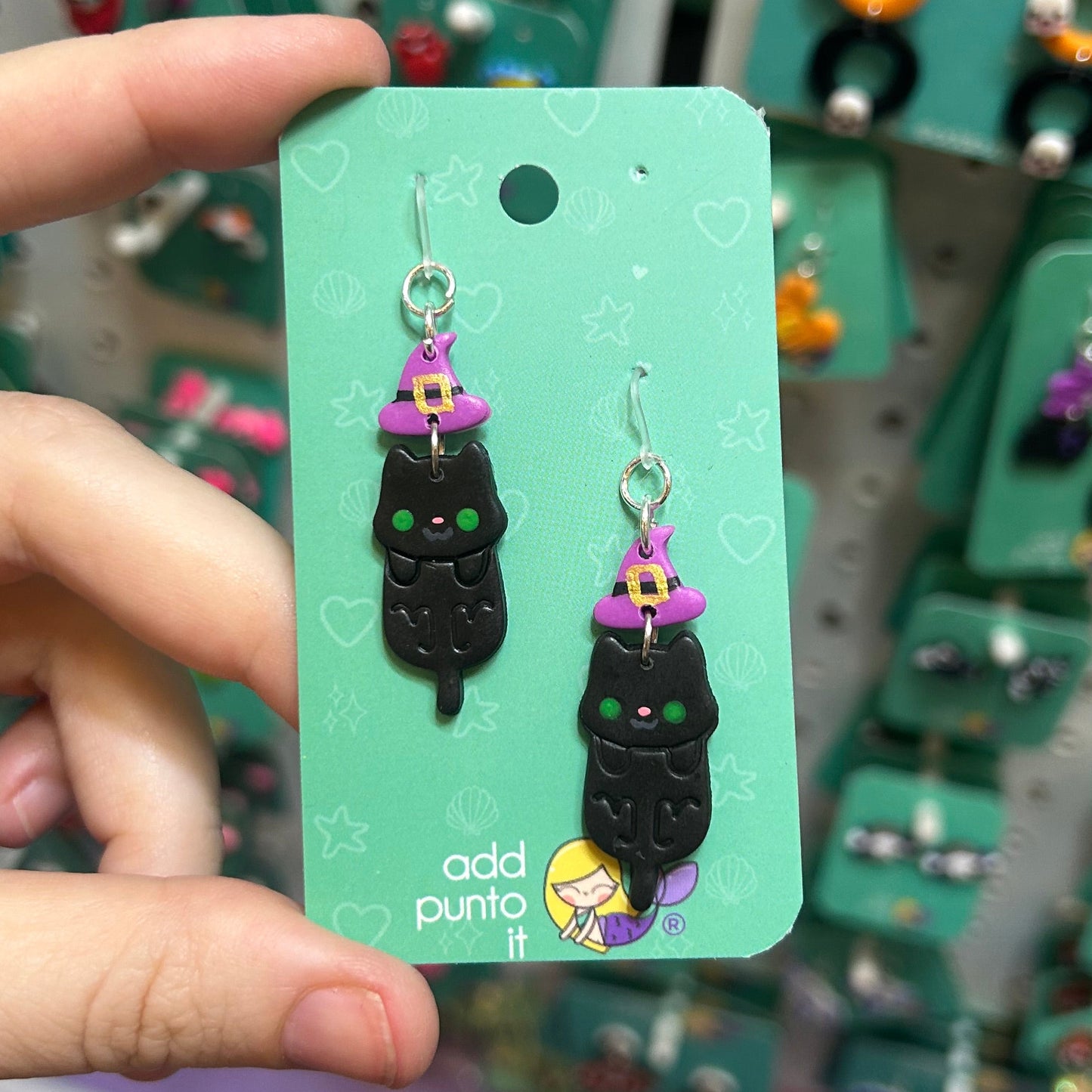 Arete · Gato bruja 💜 2026