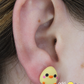 Aretes · Pollito