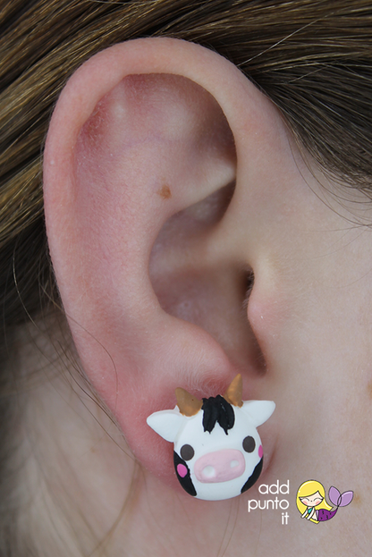 Aretes · Vaca